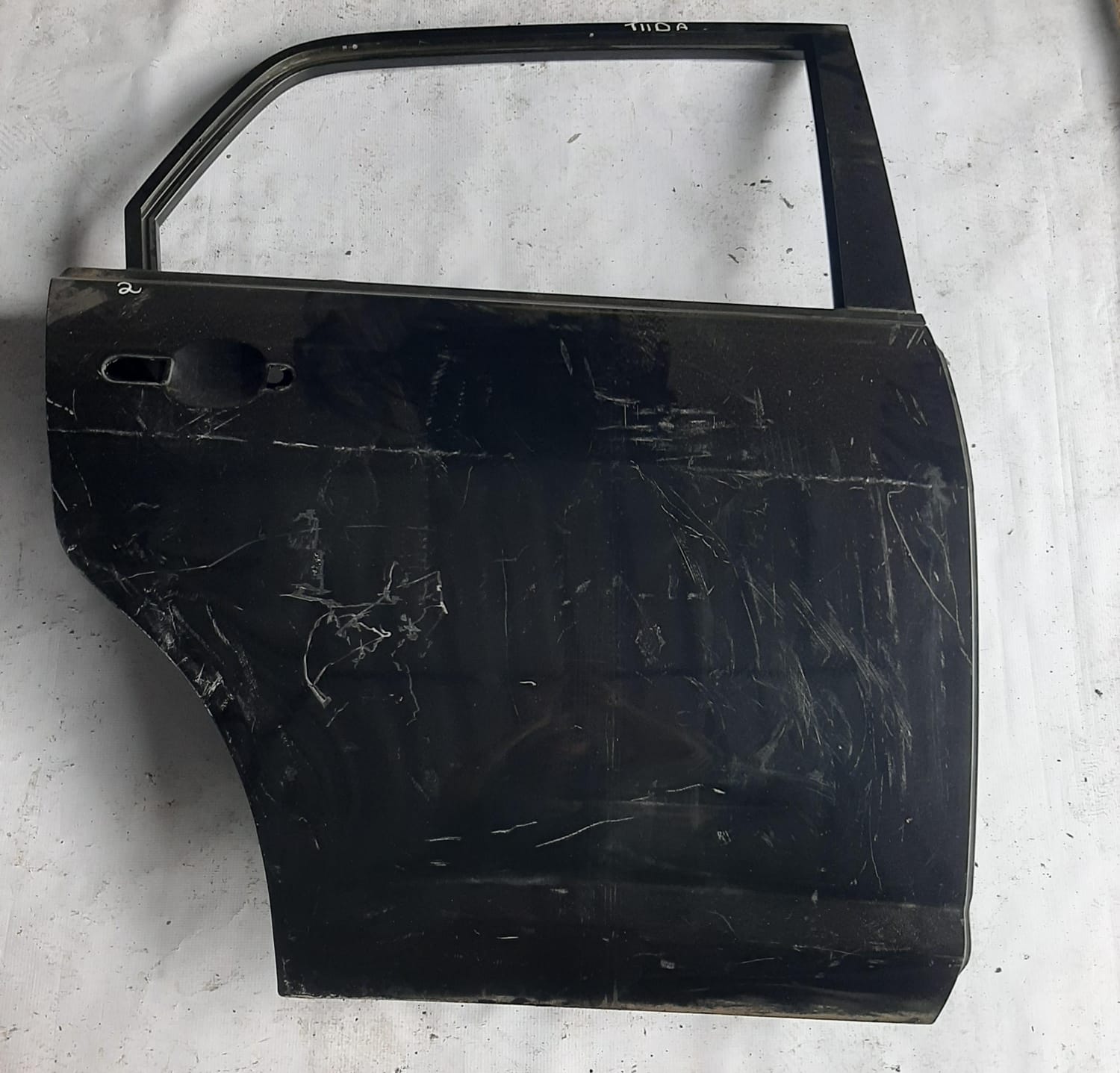 PORTA TRASEIRA TIIDA LADO DIREITO (PRETA)