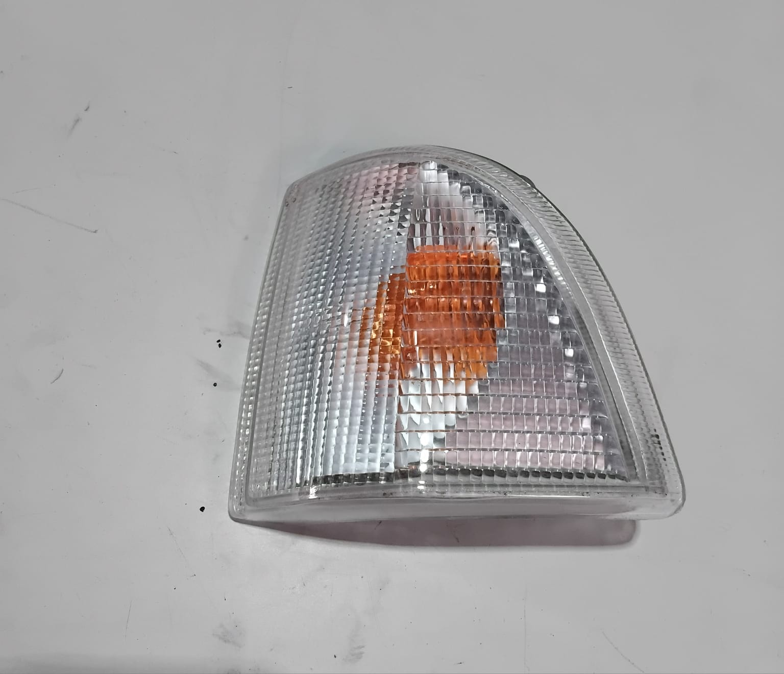 LANTERNA DIANTEIRA DEL REY 1985/1991 LADO ESQUERDO CRISTAL N