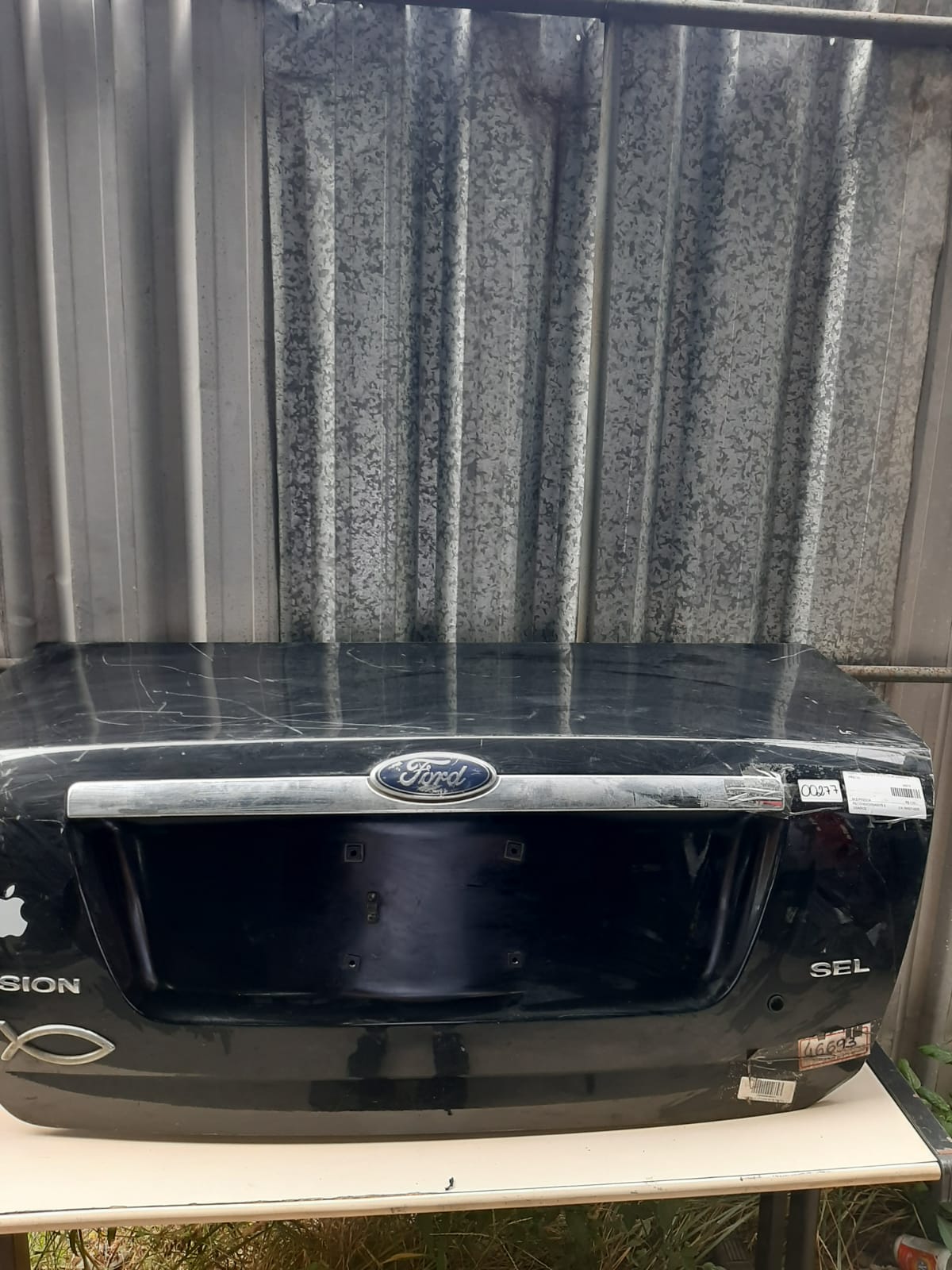 TAMPA TRASEIRA FORD FUSION 2009/2012 (PRETA)