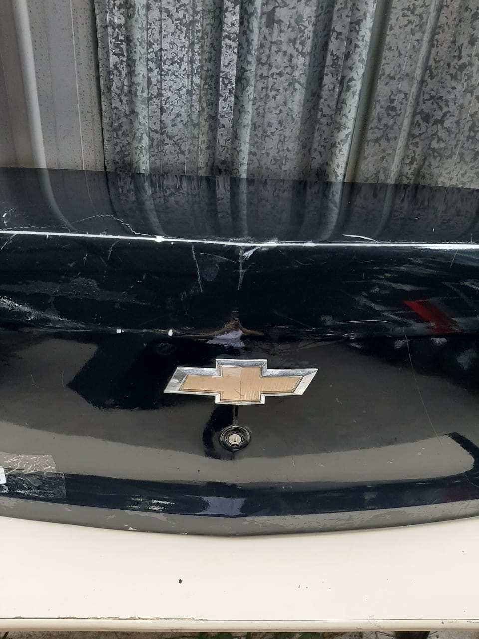 TAMPA TRASEIRA  COBALT 2012/2015 (PRETA) - Imagem 5