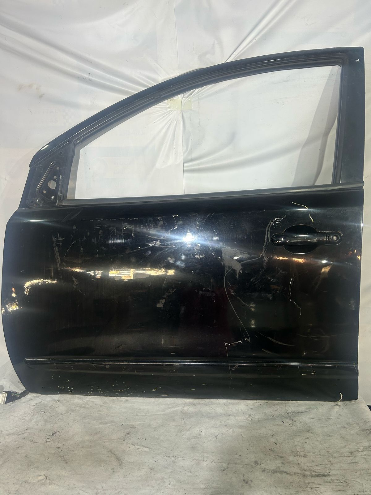 PORTA DIANTEIRA LE NISSAN LIVINA 2009/2012 (PRETA)