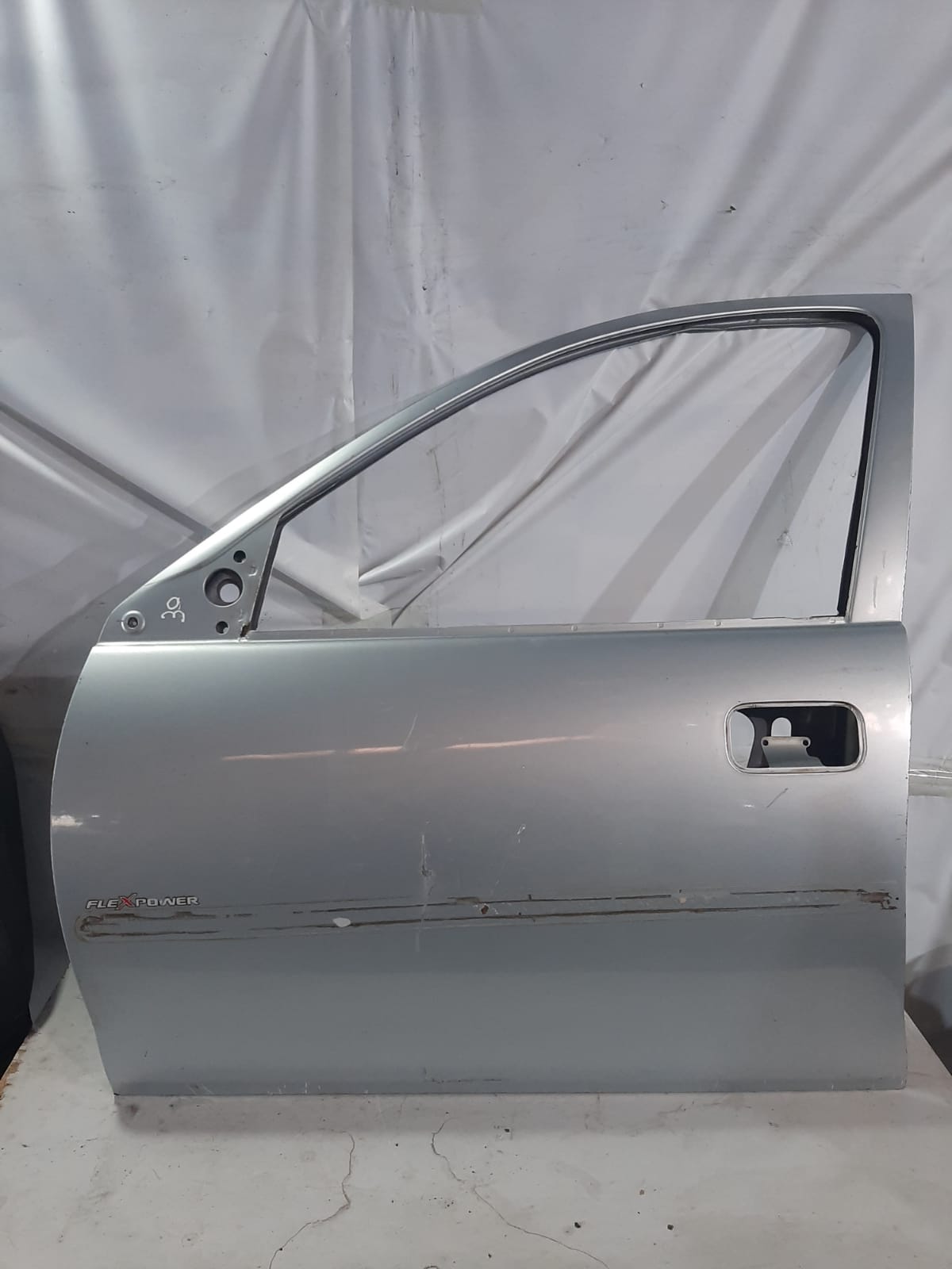 PORTA DIANTEIRA CORSA 4P 1996/2008 LADO ESQUERDO (PRATA)