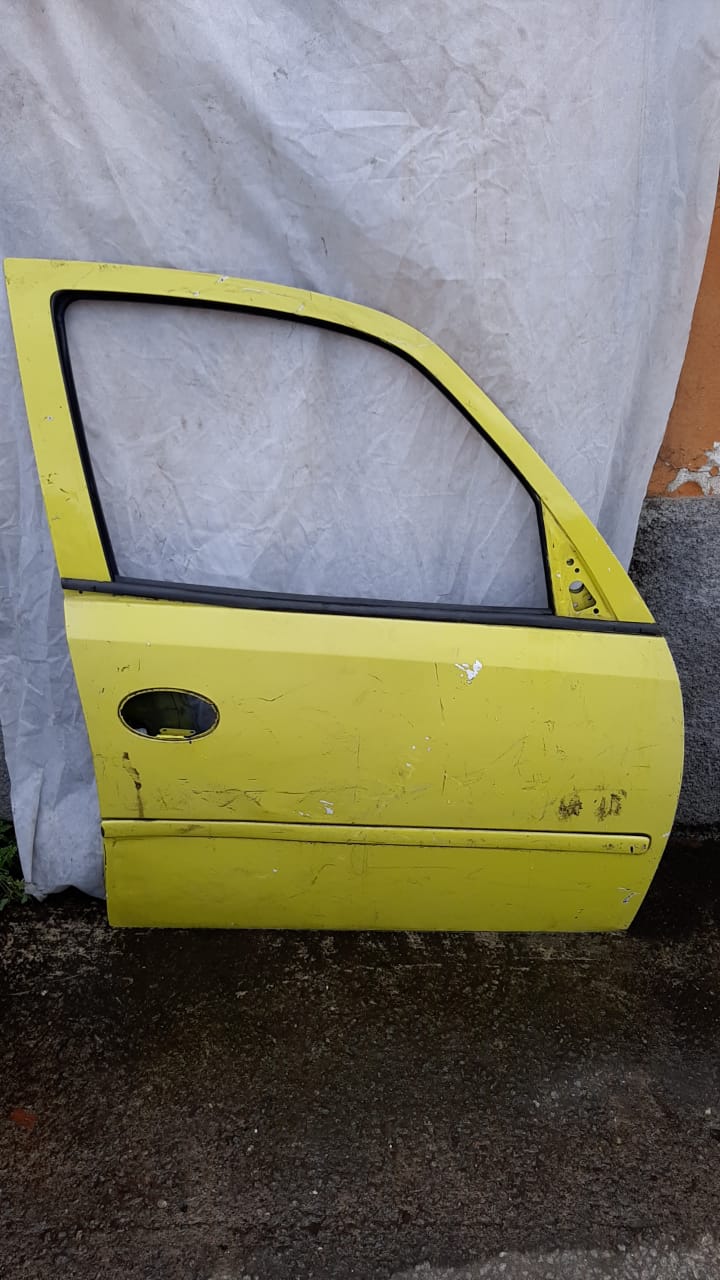 PORTA DIANT MERIVA AMARELA 03/12 LD