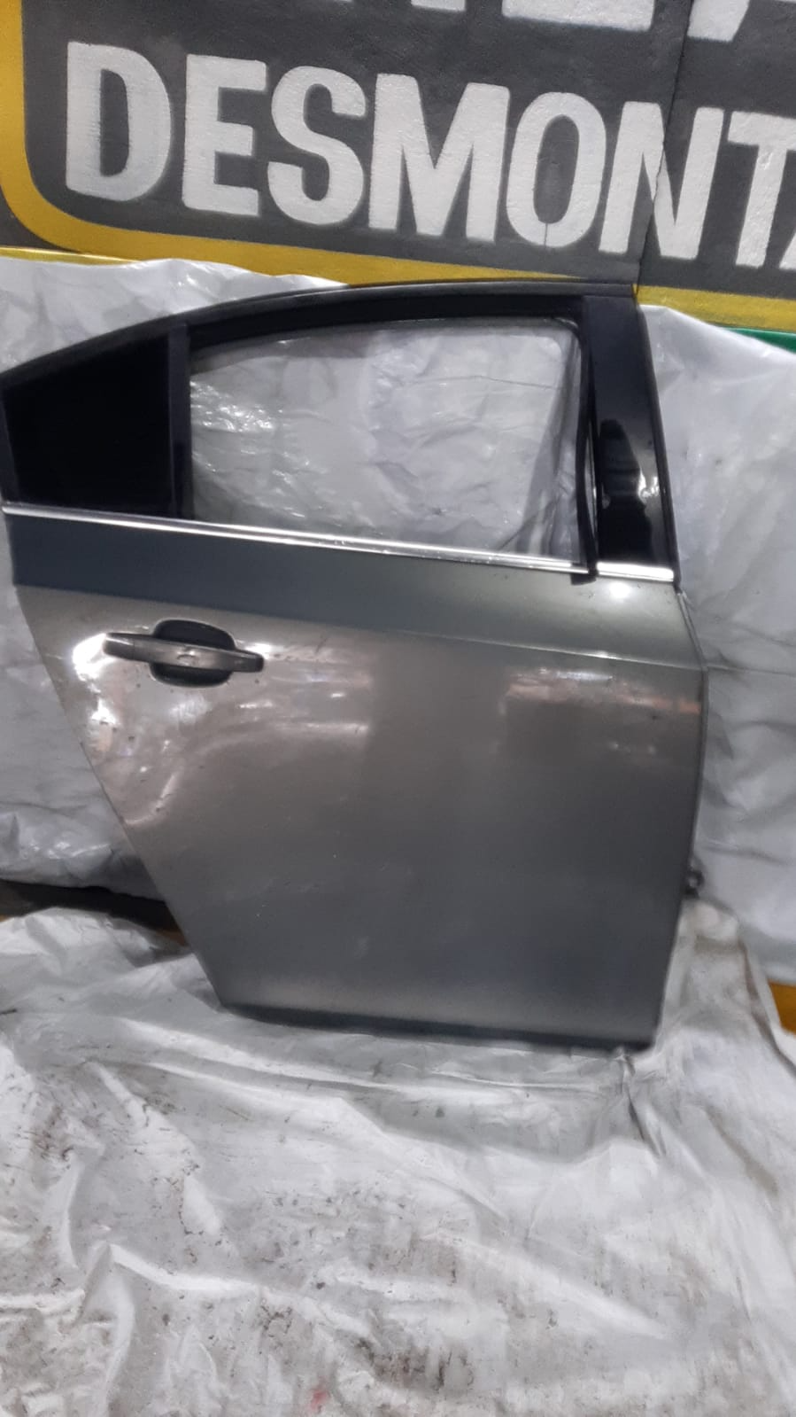 PORTA TRAS CRUZE 12/16 LD