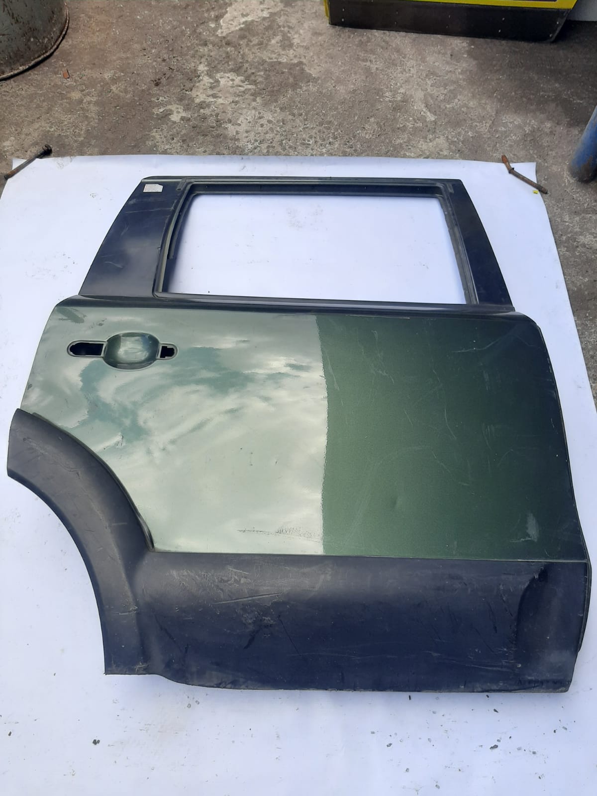 PORTA TRASEIRA NISSAN  2009/2014 LADO DIREITO