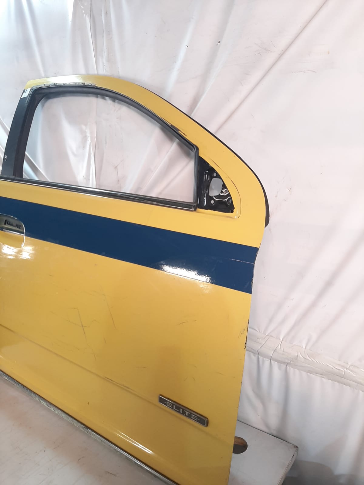 PORTA DIANTEIRA COBALT 2012/2016 LADO DIREITO (AMARELO) - Imagem 3