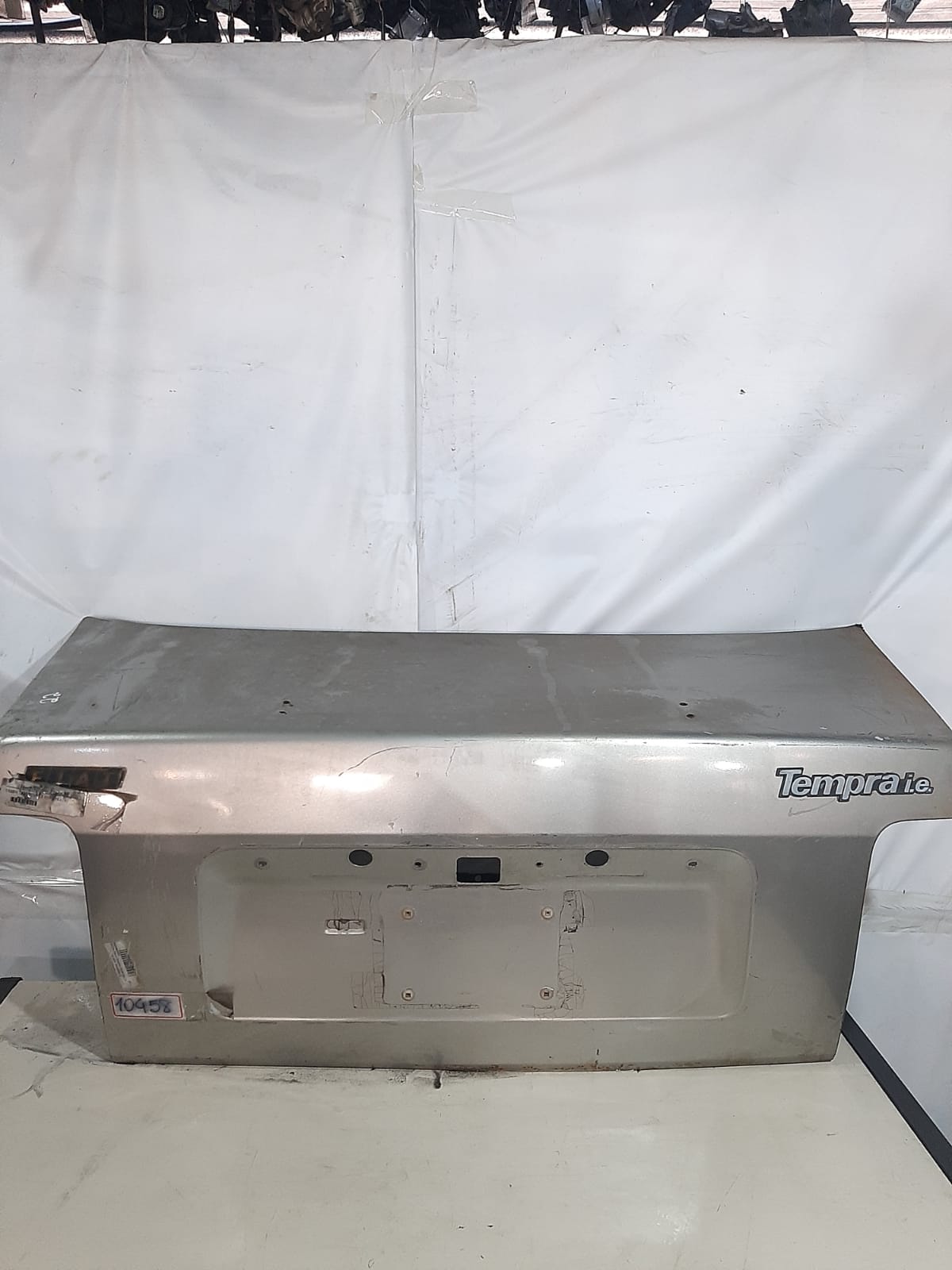 TAMPA TRASEIRA TEMPRA 1992/1999 (PRATA)