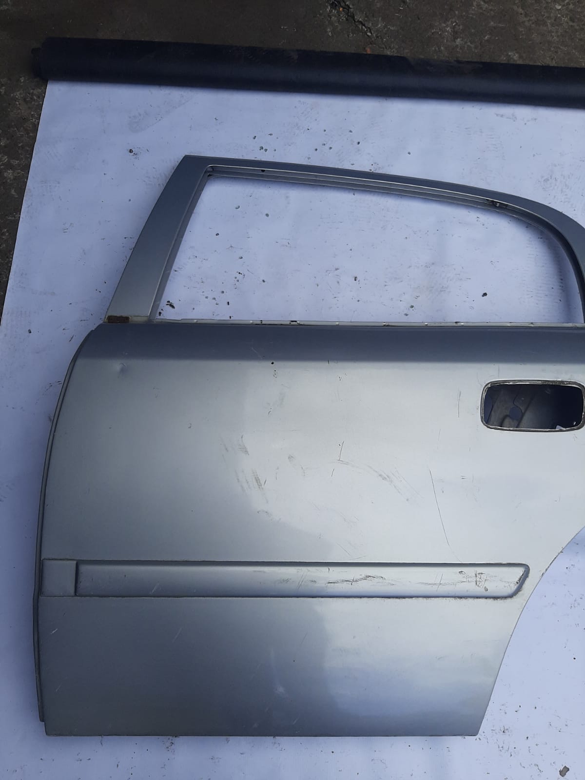 PORTA TRASEIRA ASTRA SEDAN 1999/2007 LADO ESQUERDO (PRATA)